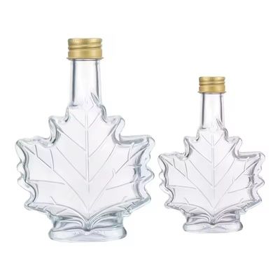 Industrielle Glasflasche für Getränke in kundenspezifischer Farbe in Form von Ahornblättern 50 ml 100 ml 250 ml